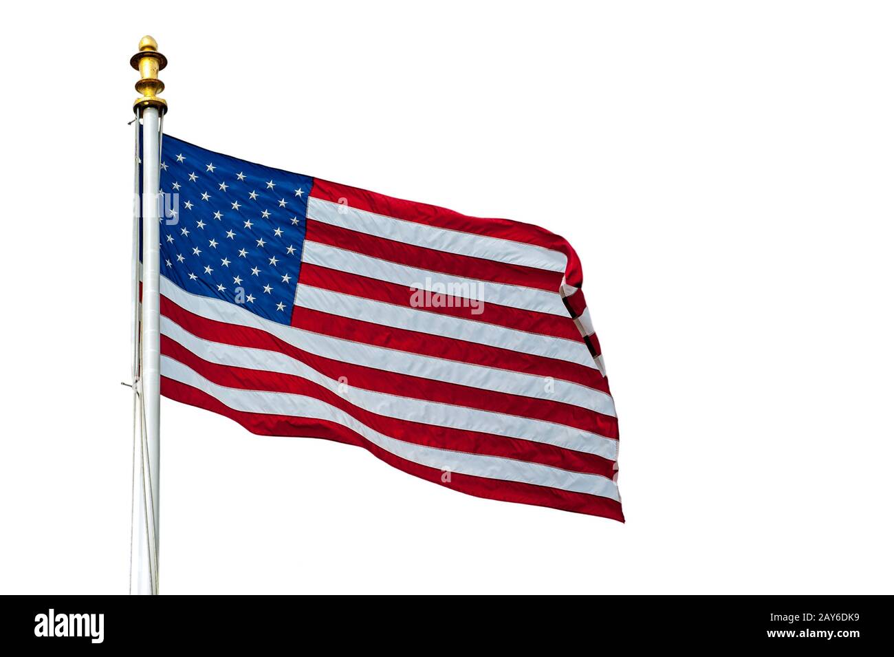 American flag showing US Stars and Stripes blowing in the wind against ...
