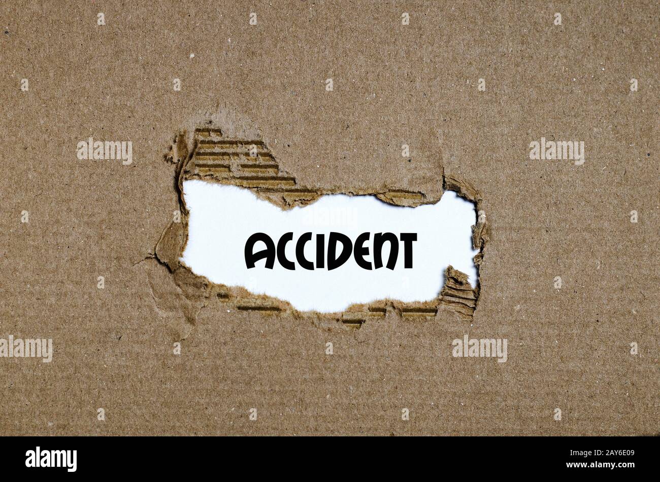 the-word-accident-appearing-behind-torn-paper-stock-photo-alamy