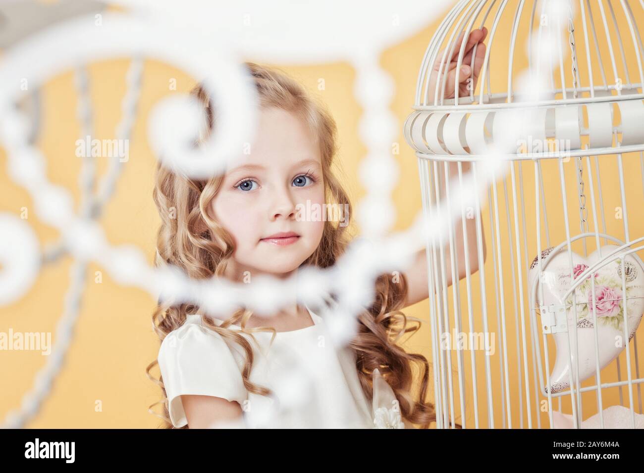 Image of lovely little girl with long curly hair Stock Photo - Alamy