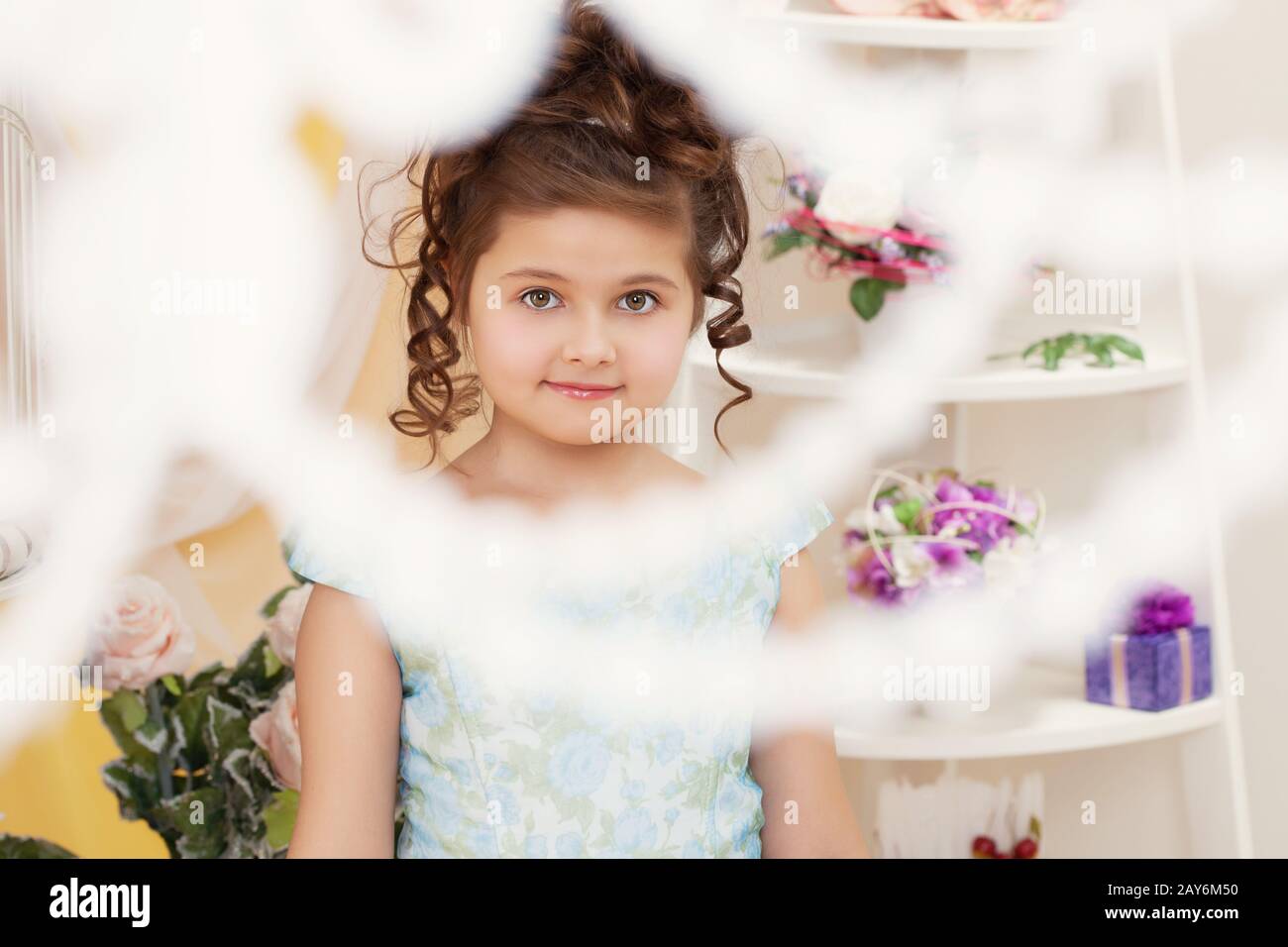 Shot of beautiful little girl smiling at camera Stock Photo - Alamy