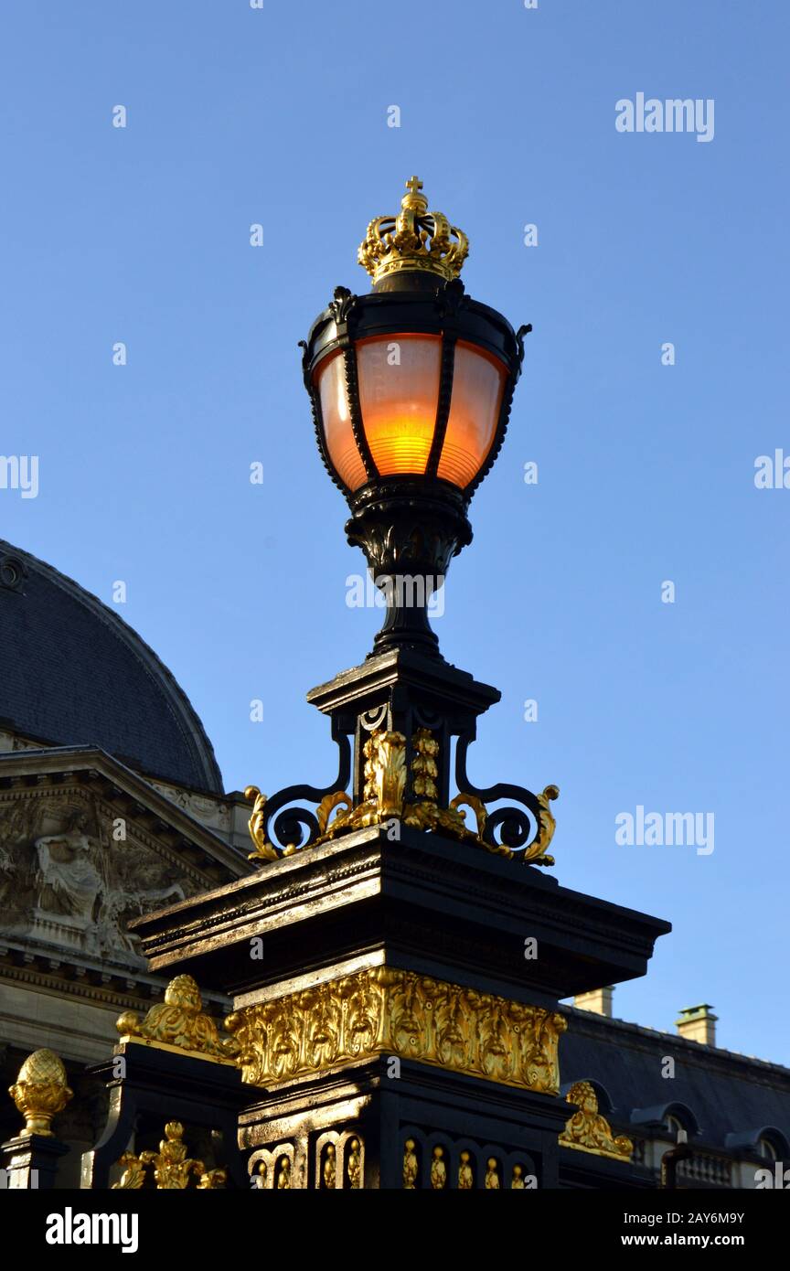 Royal lantern with a crown and gold gilding placed on a column Stock Photo  - Alamy