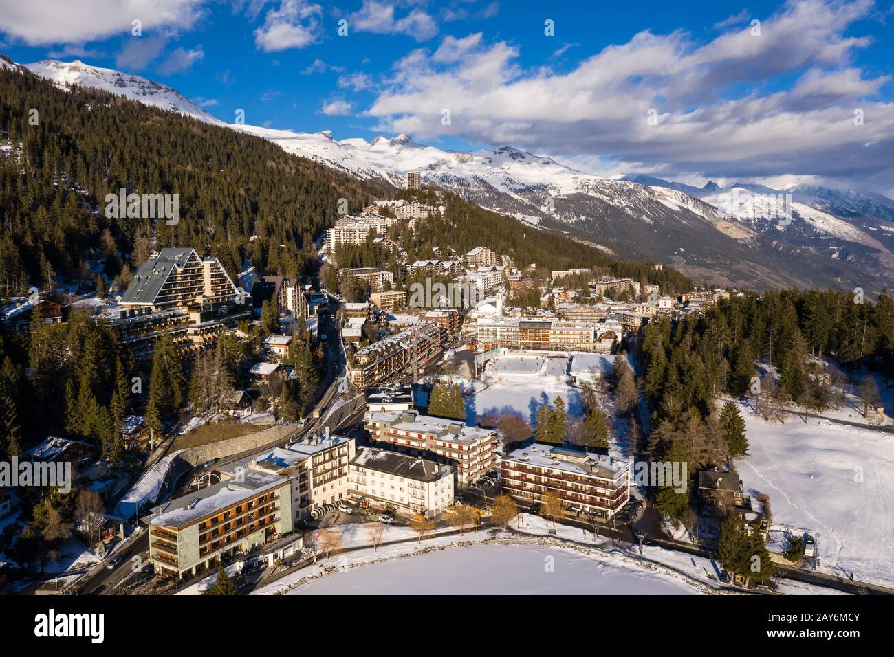Aerial view of the famous Crans Montana village in the Swiss alps in Canton Valais in Switzerland. The village is a famous tourism and ski resort dest Stock Photo
