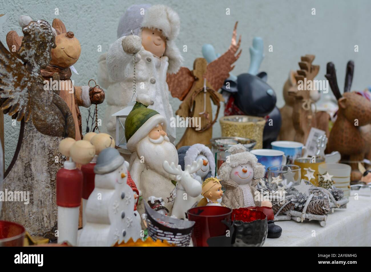colourful selection of gifts and Christmas figures at the sales table Stock Photo