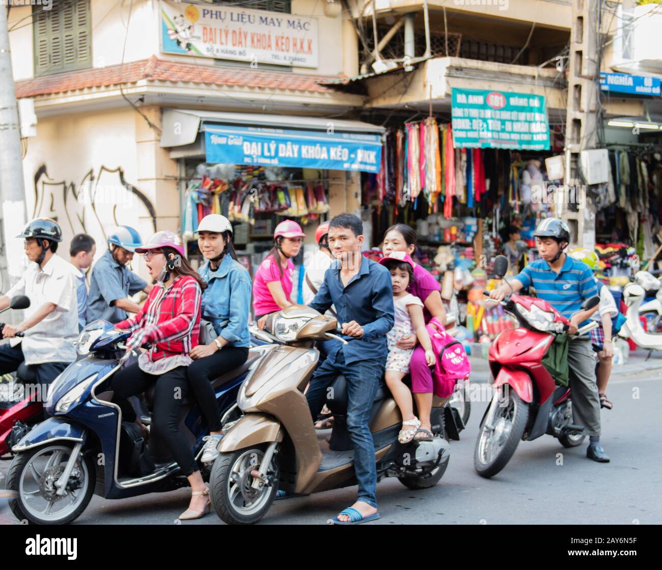Hanoi Trang Tien Plaza Entrance At Night With Motorbike Traffic