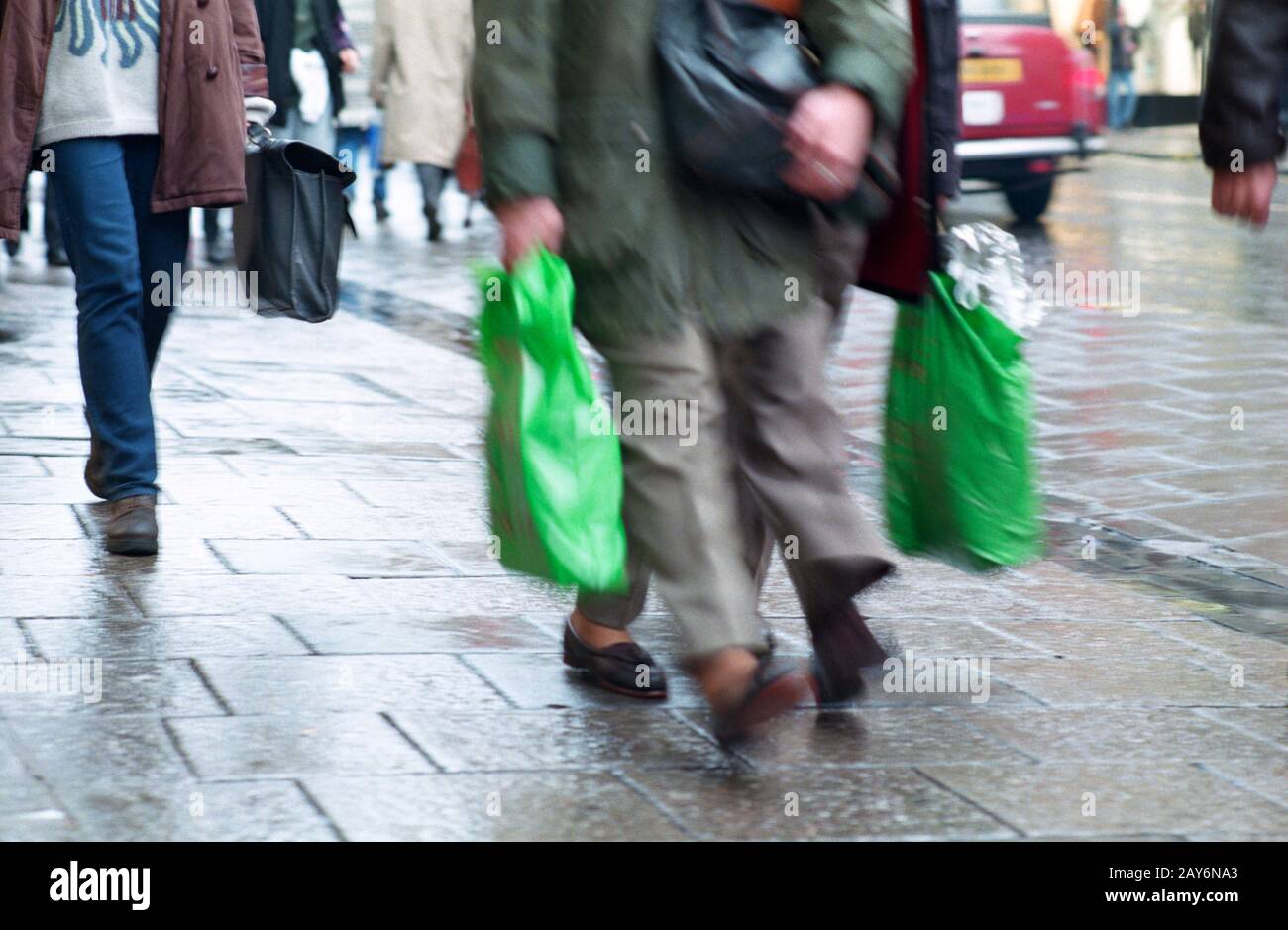 Shoppers enduring the rain on Oxford Street London Stock Photo