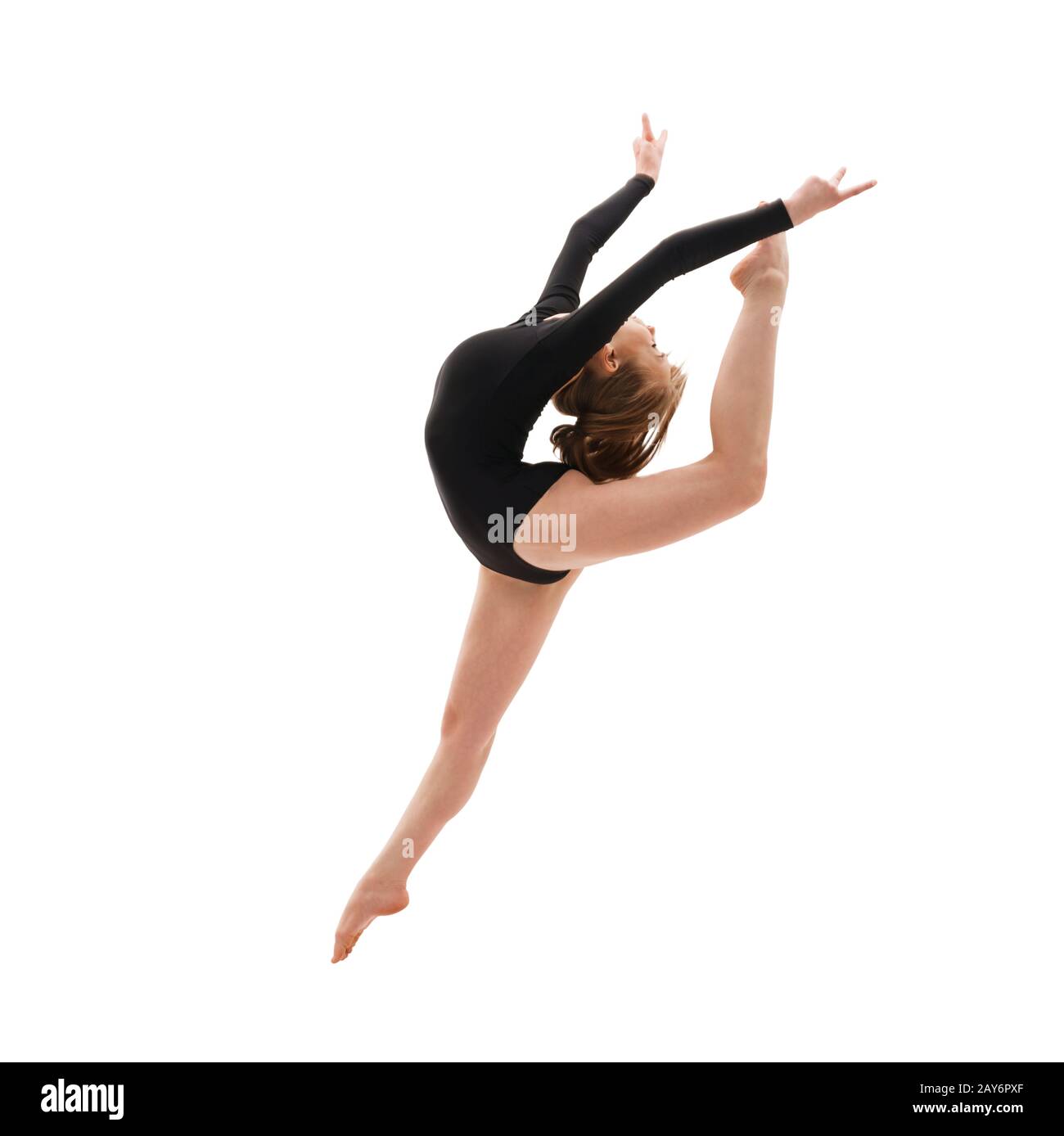 Young gymnast in elegant jump studio shot Stock Photo
