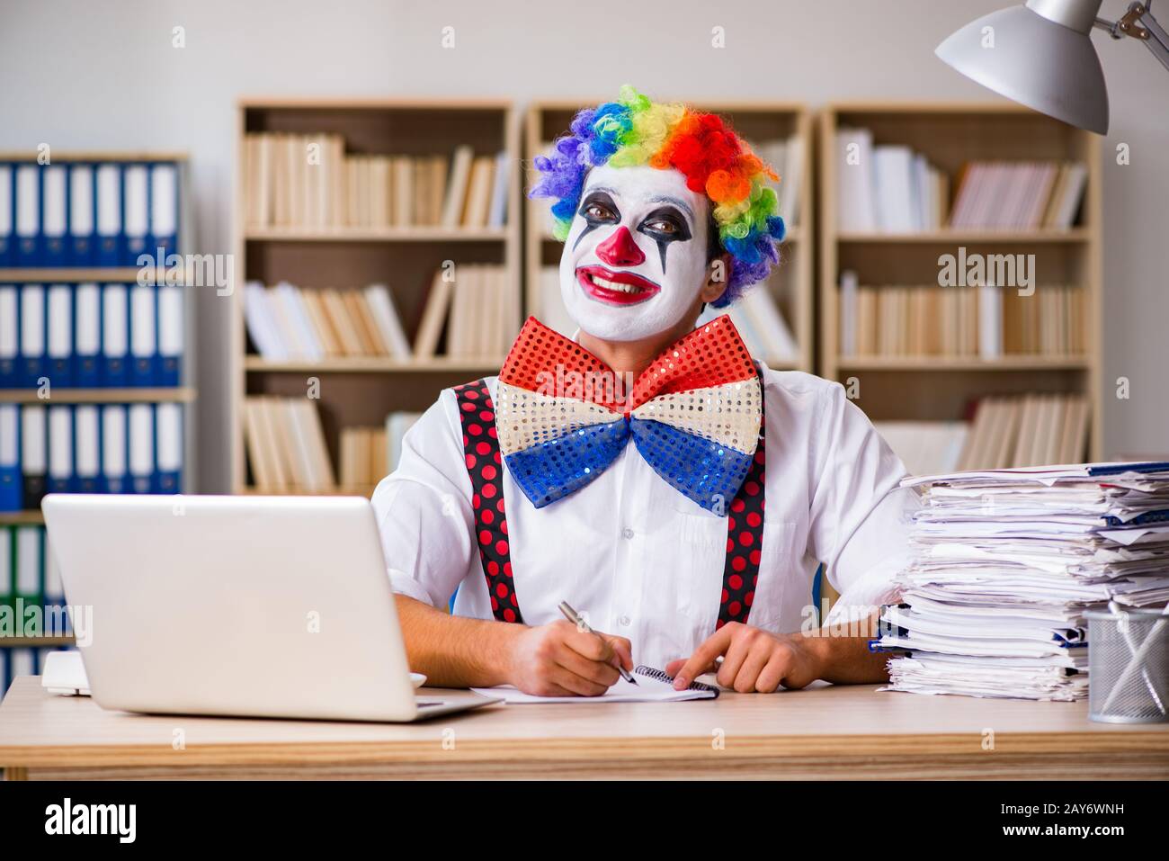 Work Cloan Clown businessman working in the office Stock Photo - Alamy