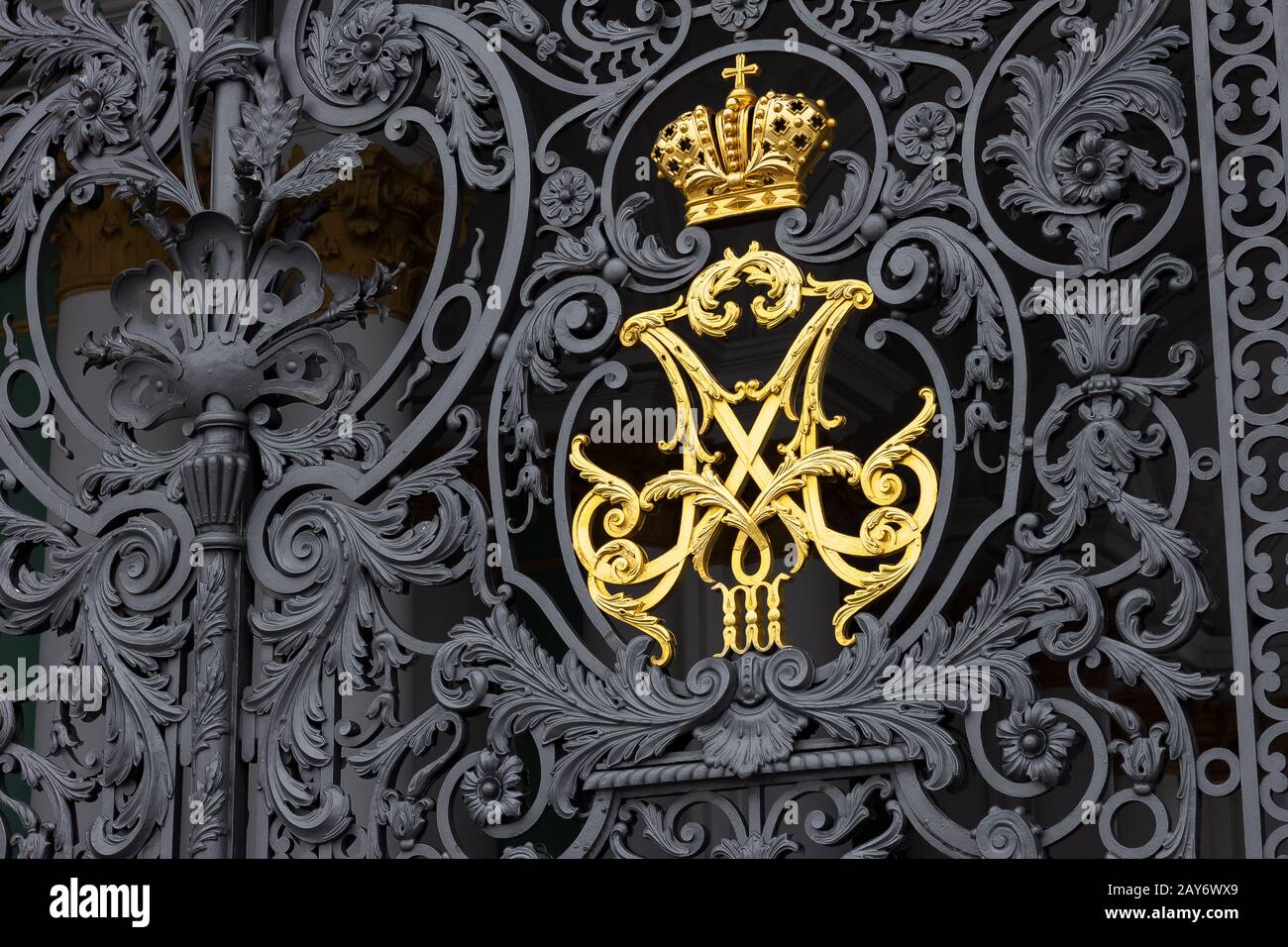 Golden Royal imperial coat of arms crown on the gate Stock Photo - Alamy