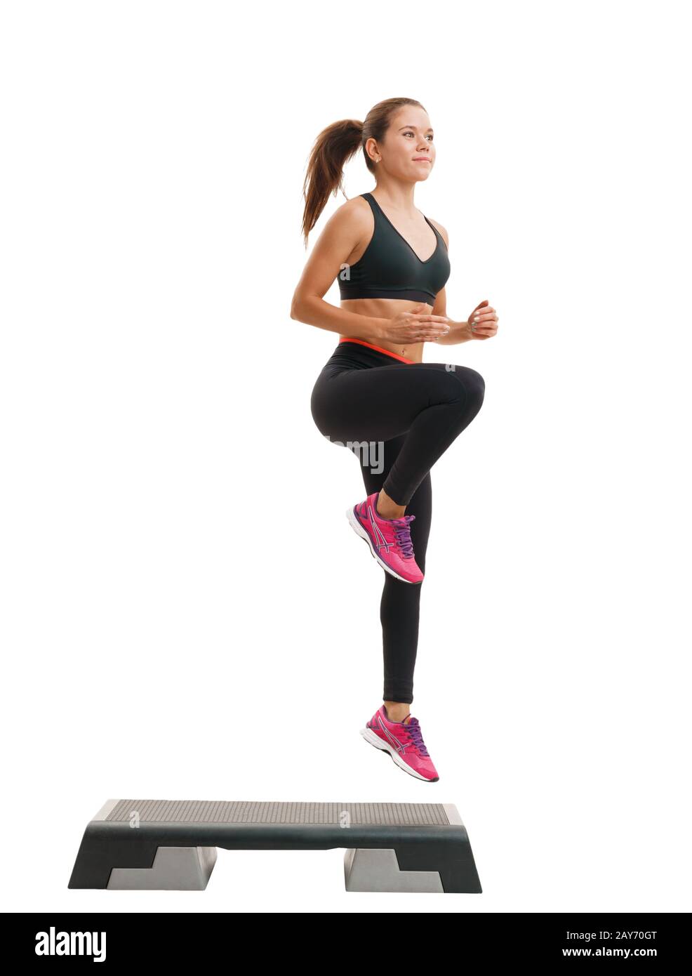 Fit woman in sportswear at step-aerobics class Stock Photo - Alamy