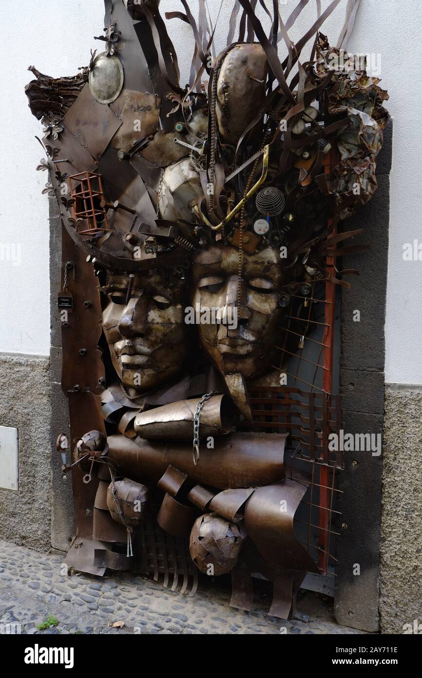 Two heads, art object from metal, Funchal, Madeira Stock Photo