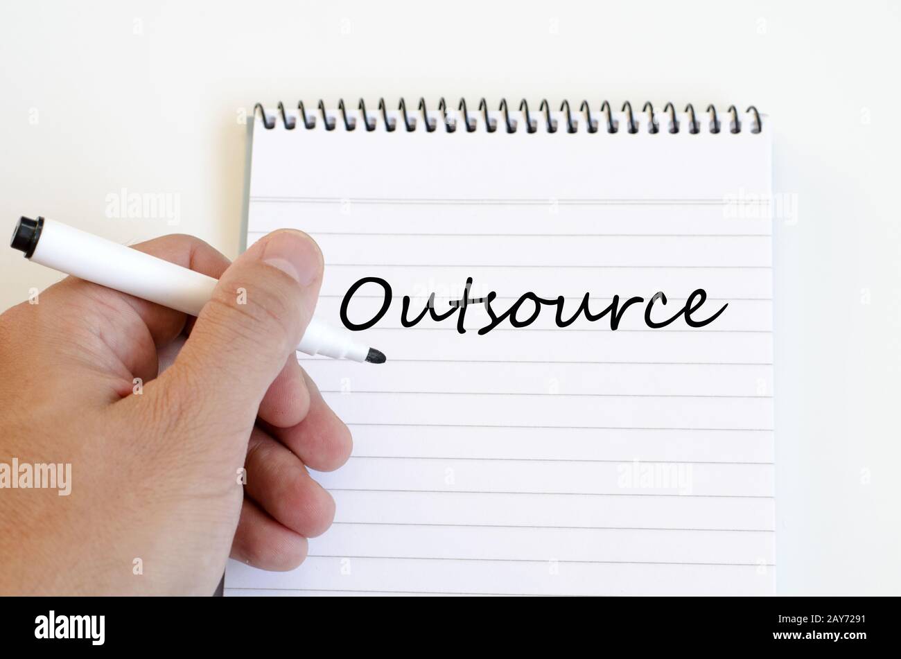 Outsource concept on notebook Stock Photo