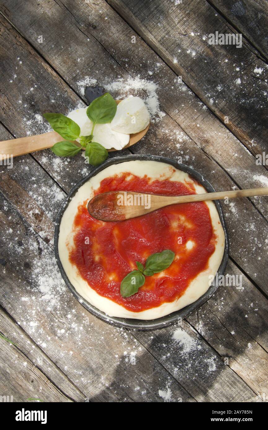 Raw pizza base Stock Photo Alamy