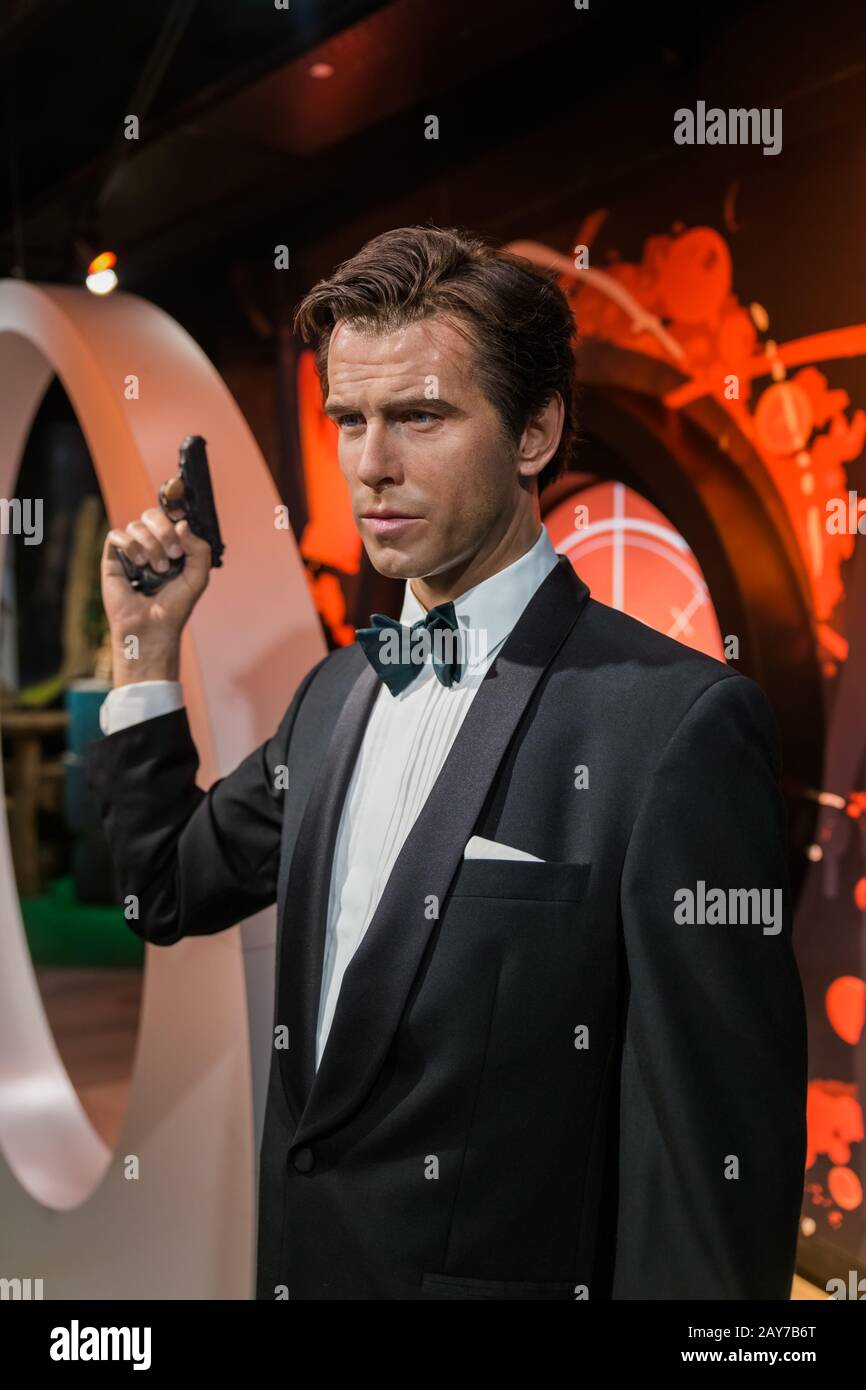 Wax figure of Pierce Brosnan as James Bond 007 agent in Madame Tussauds Wax museum in Amsterdam, Netherlands Stock Photo