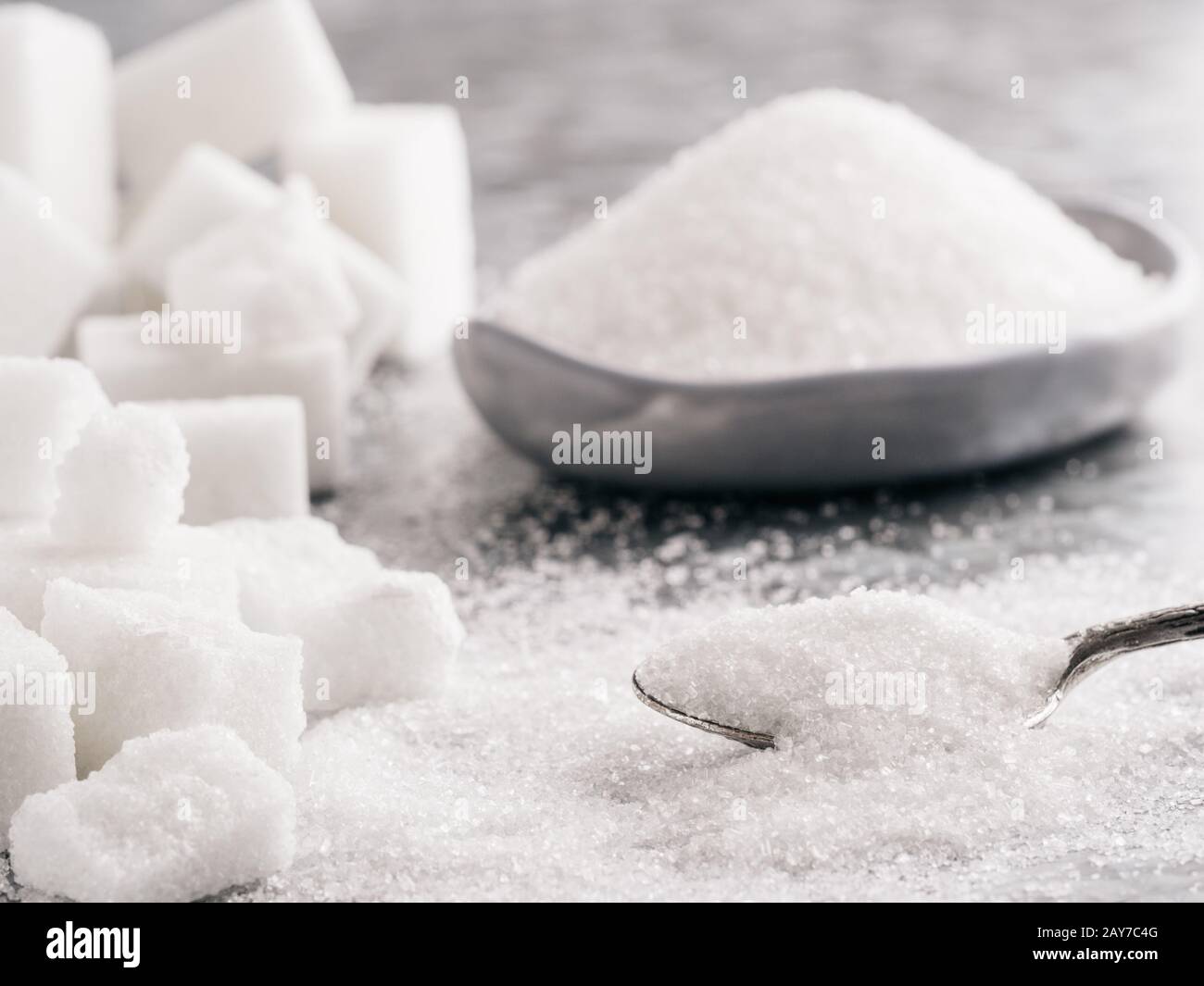 Granulated sugar and cubes of sugar Stock Photo