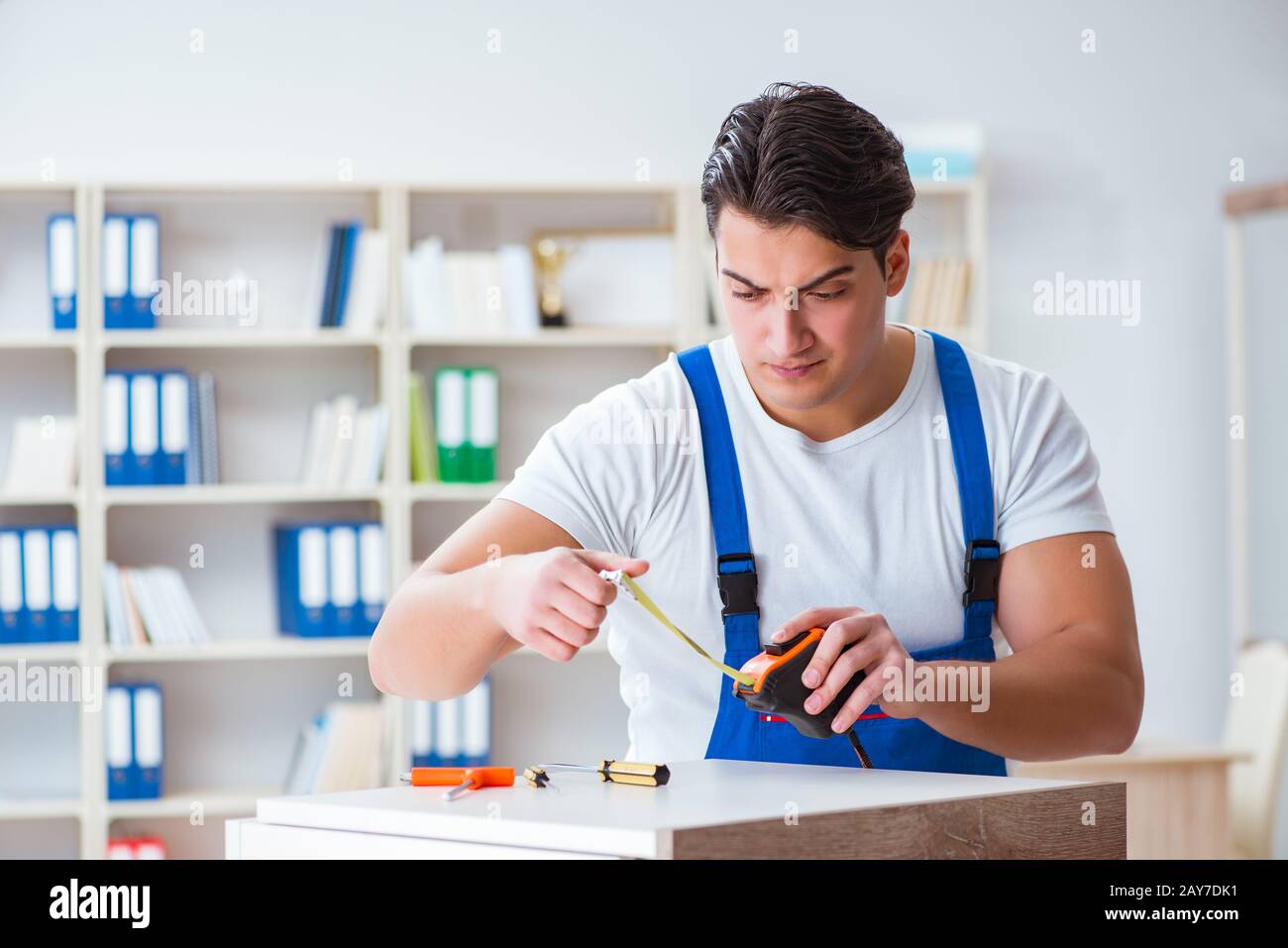 Furniture repair and assembly concept Stock Photo Alamy