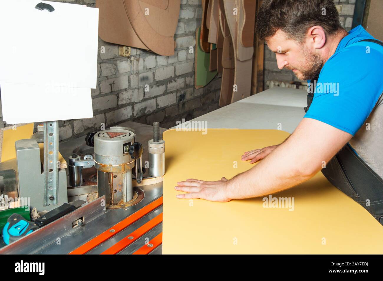 Man works for Edge Banding Machine Stock Photo Alamy