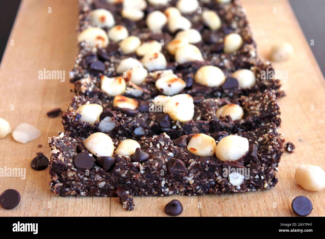 Homemade brownie without baking. brownie with nuts and grains. Healthy cake. Tasty home-made sweets. Stock Photo