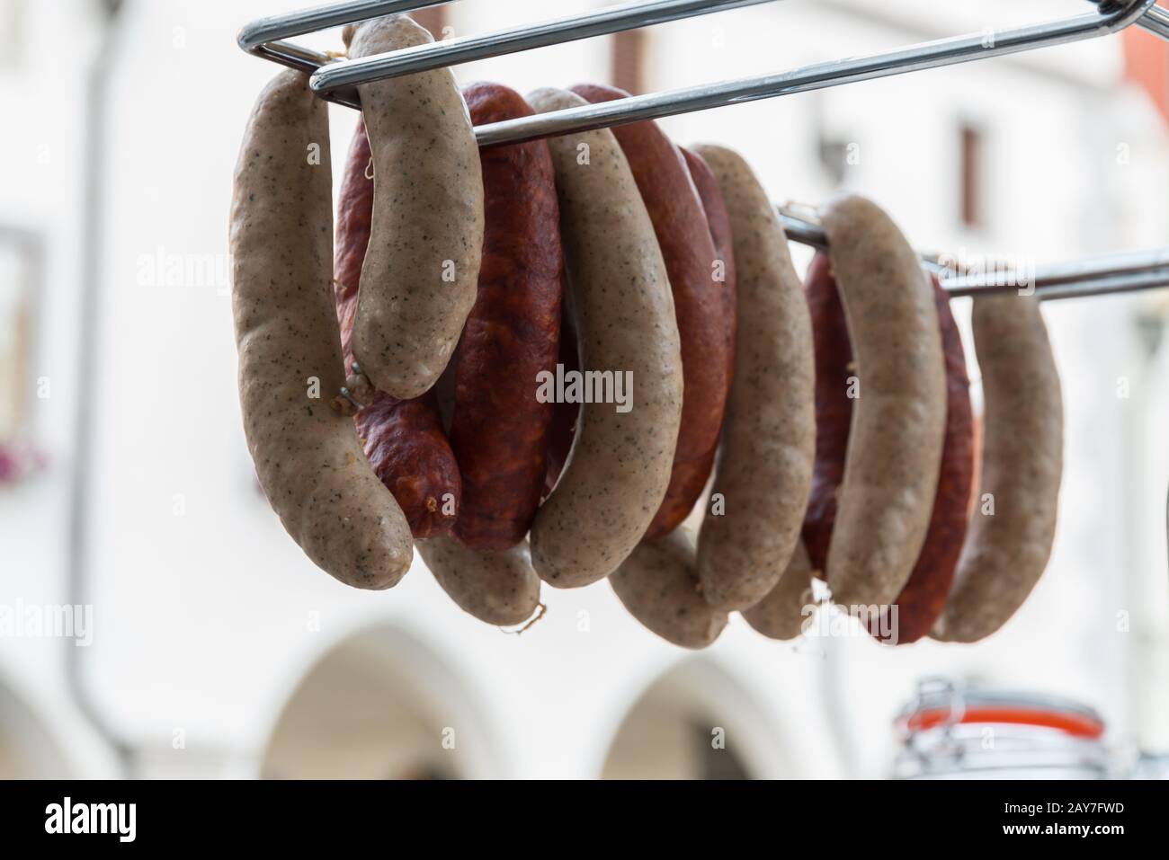 Two different types of sausages hung up - close-up and depth-of-field Stock Photo