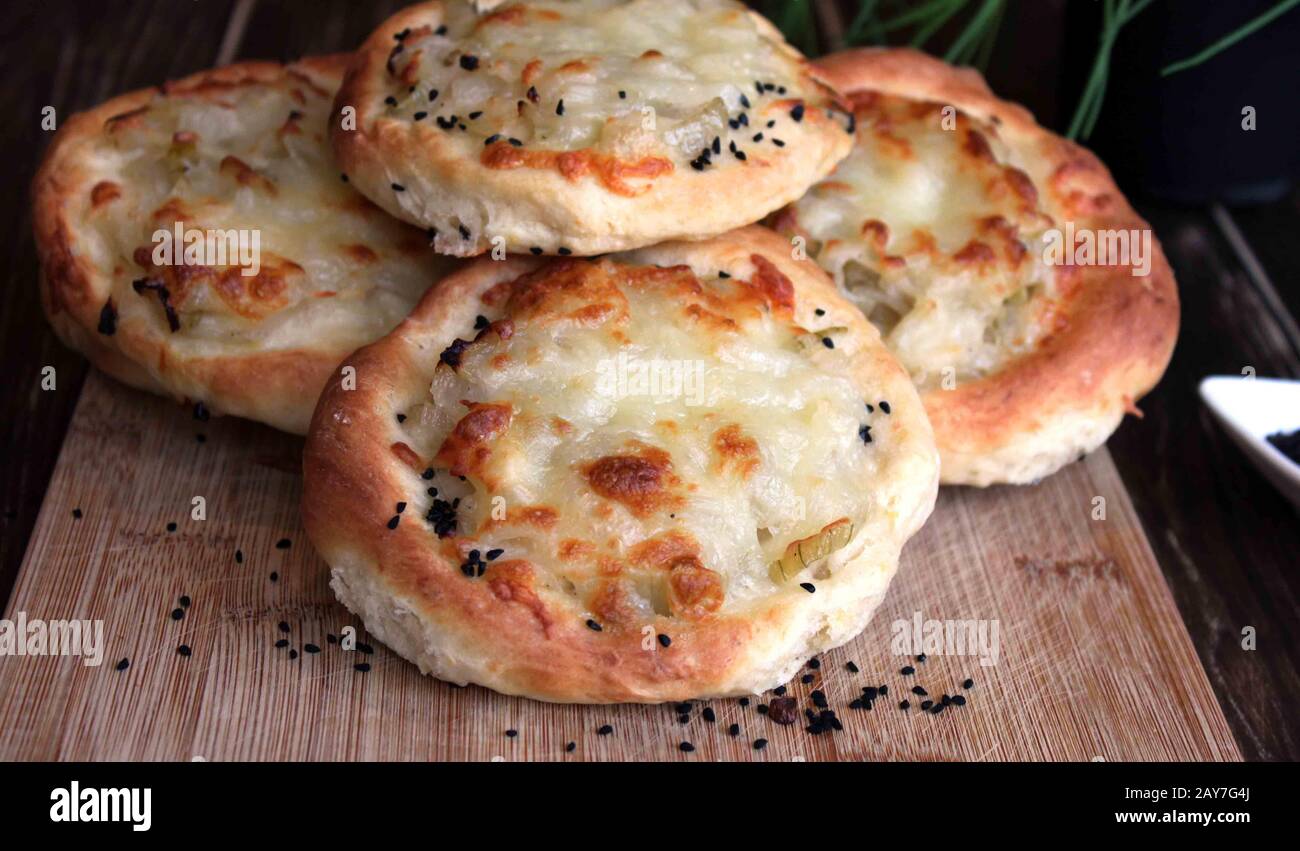 Onion cake. Yeast roll with onion and cheese. Tasty roll. A healthy