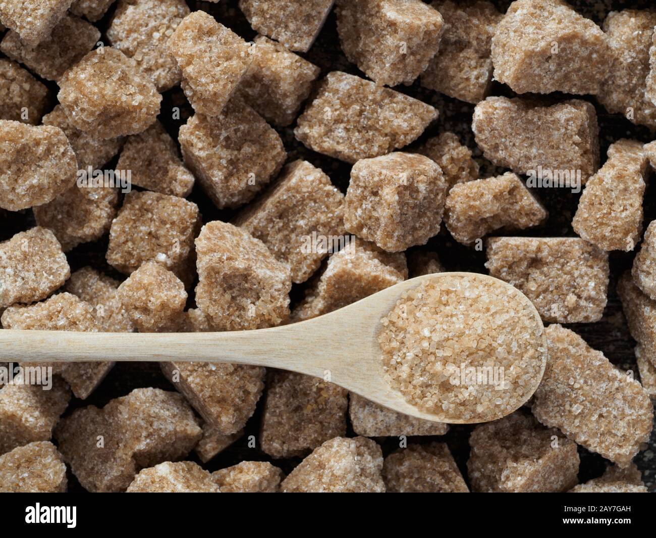 Rushy raw sugar cubes close up Stock Photo