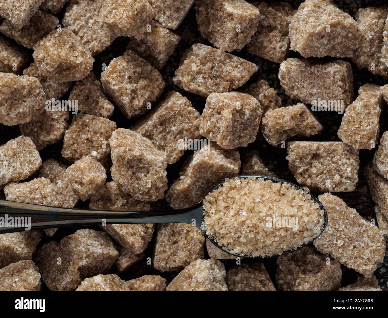 Rushy raw sugar cubes close up Stock Photo