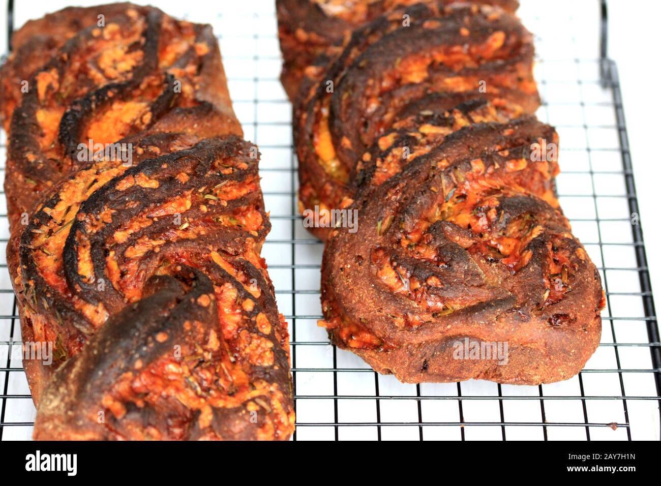 Delicate and crunchy bread. Gluten-free bread. Crunchy and tasty bread. Healthy bread. Bread with cheddar cheese. Cheese Bread Stock Photo