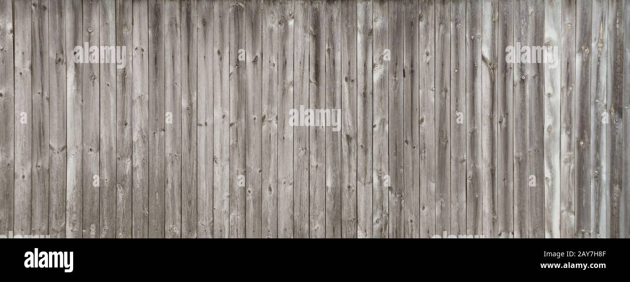 Long gray wooden fence Stock Photo