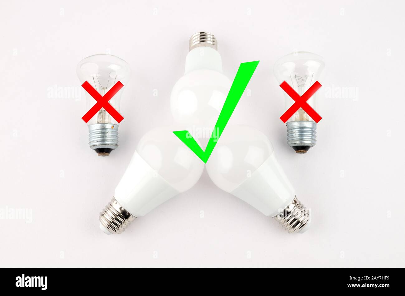 several LED energy saving light bulbs over the old incandescent, use of  economical and environmentally friendly light bulb conce Stock Photo - Alamy