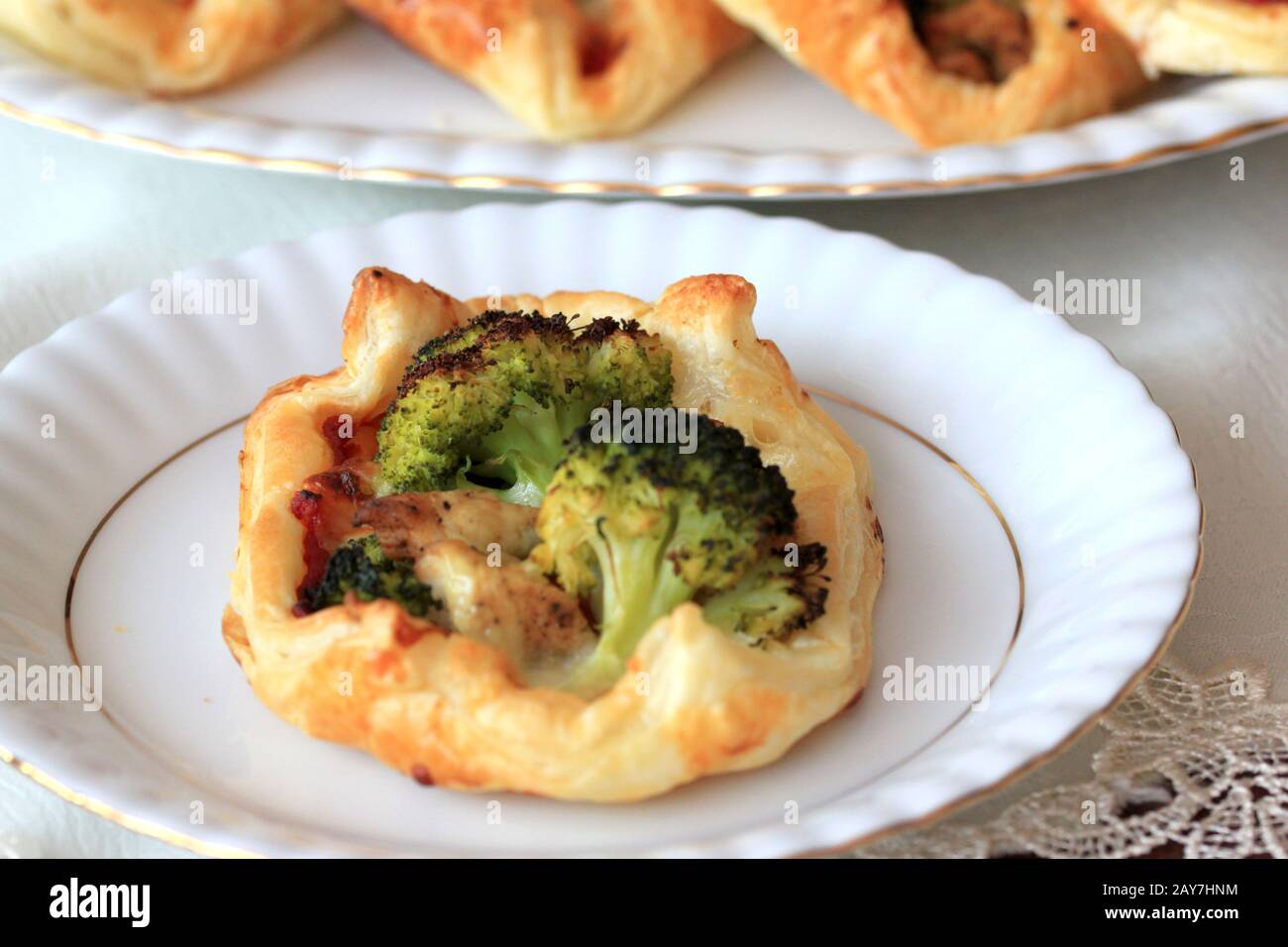 A delicious and tasty snack. Puff pastry with broccoli and cheese