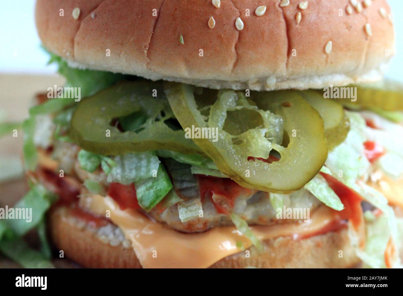 A delicious home-made hamburger with meat and vegetables.Tasty  A delicious home-made hamburger with meat and vegetables.Tasty sandwich with vegetable Stock Photo