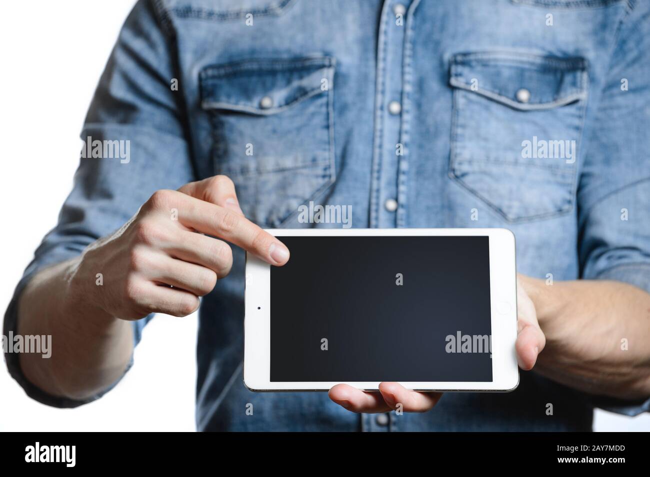 Casual man showing digital tablet computer screen in hands. Isolated on ...