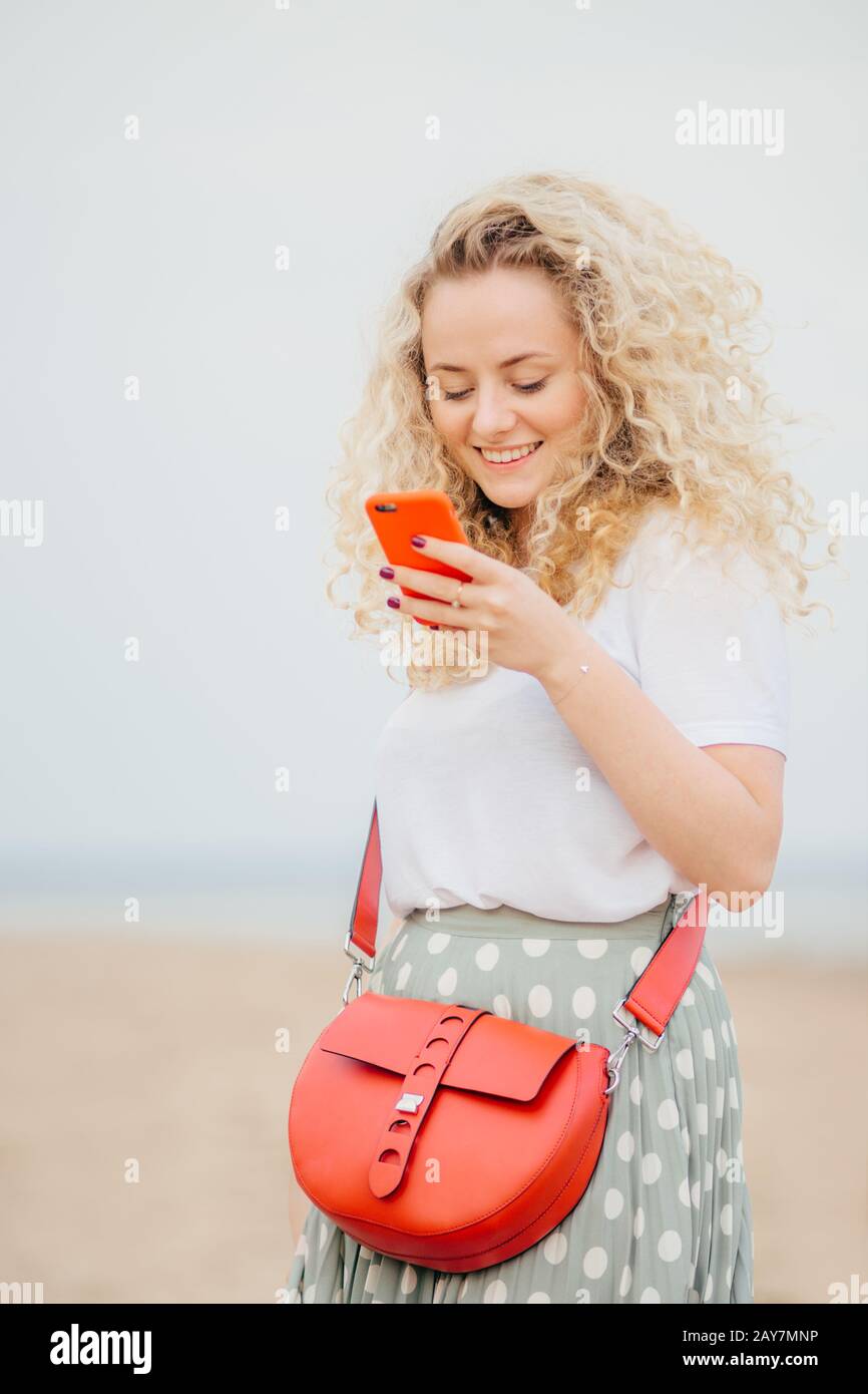 Woman uses phone hand makes hi-res stock photography and images - Alamy