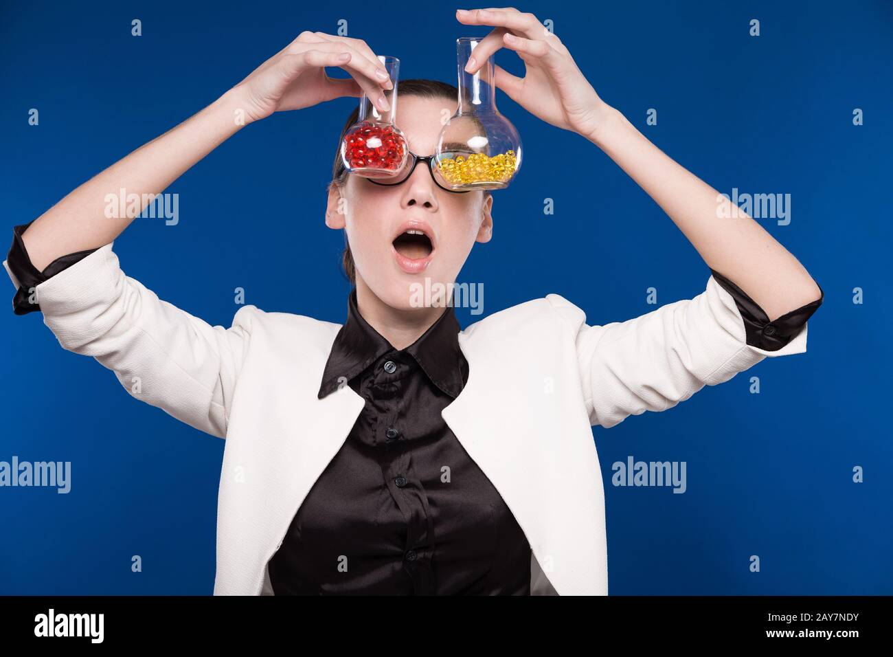 young girl with beakers Stock Photo Alamy