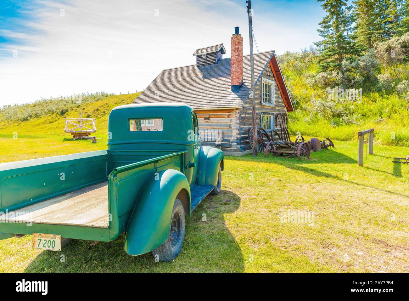 Bar u ranch  old pick up and old Canadian wooden house Stock Photo