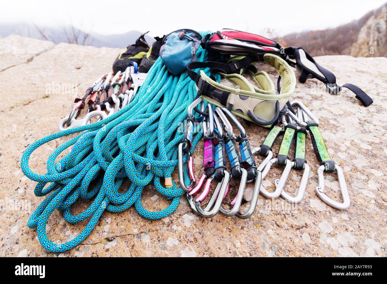 Climbing equipment rope and carbines view from the side closeup. A