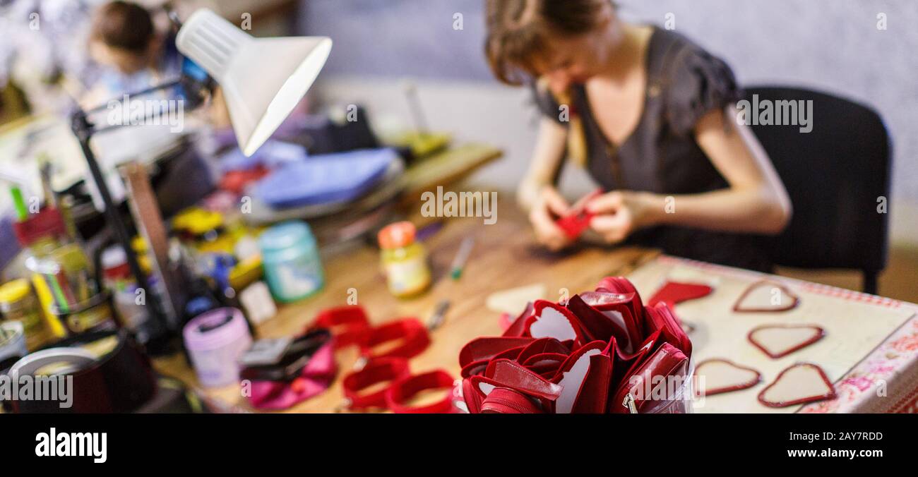 woman manufacturing purses Stock Photo