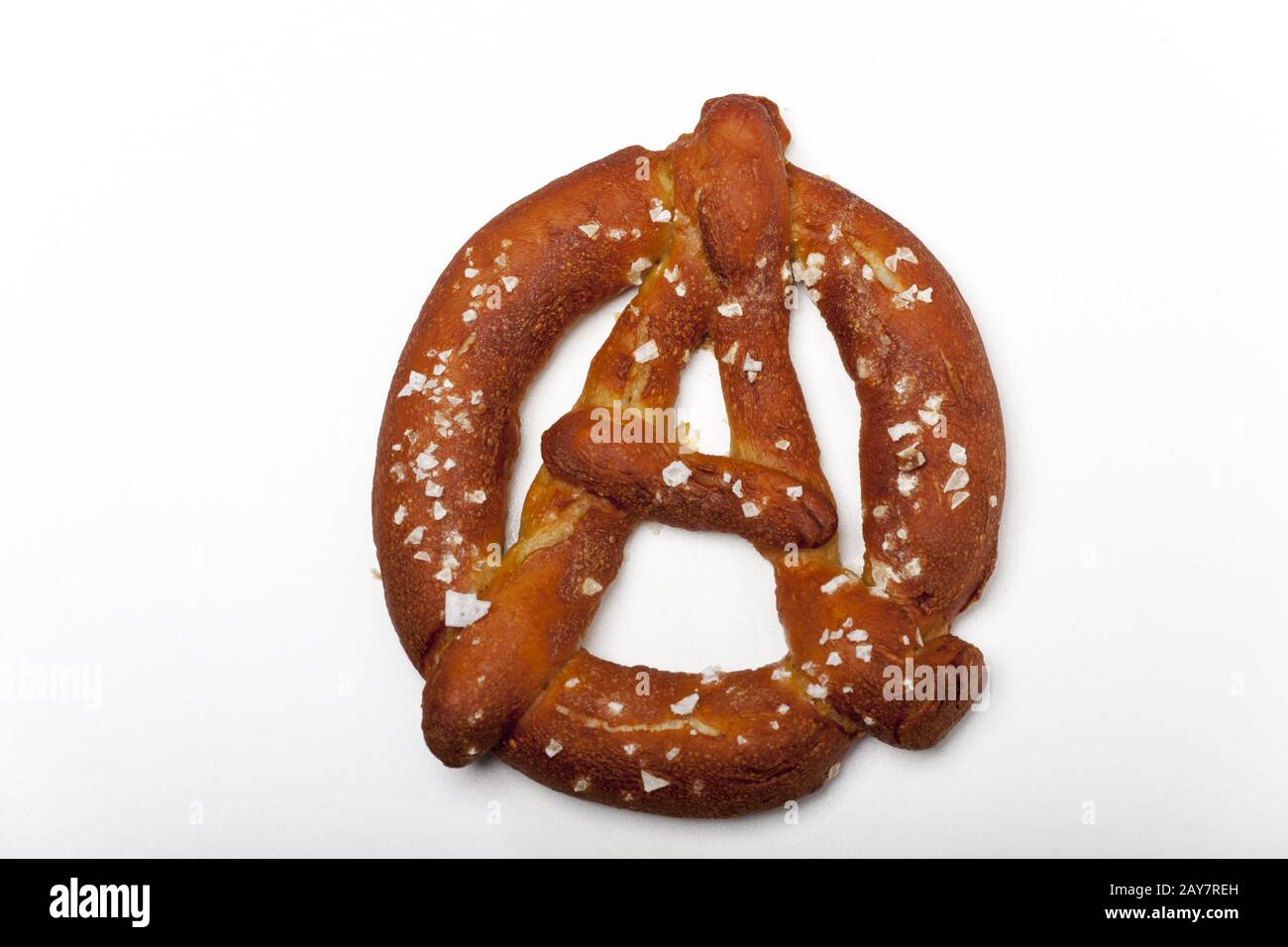 Bavarian pretzel in the form of the anarchy sign Stock Photo