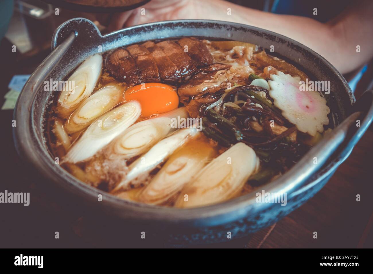 Sukiyaki in traditional Japanese Cast Iron Pot Stock Photo - Alamy