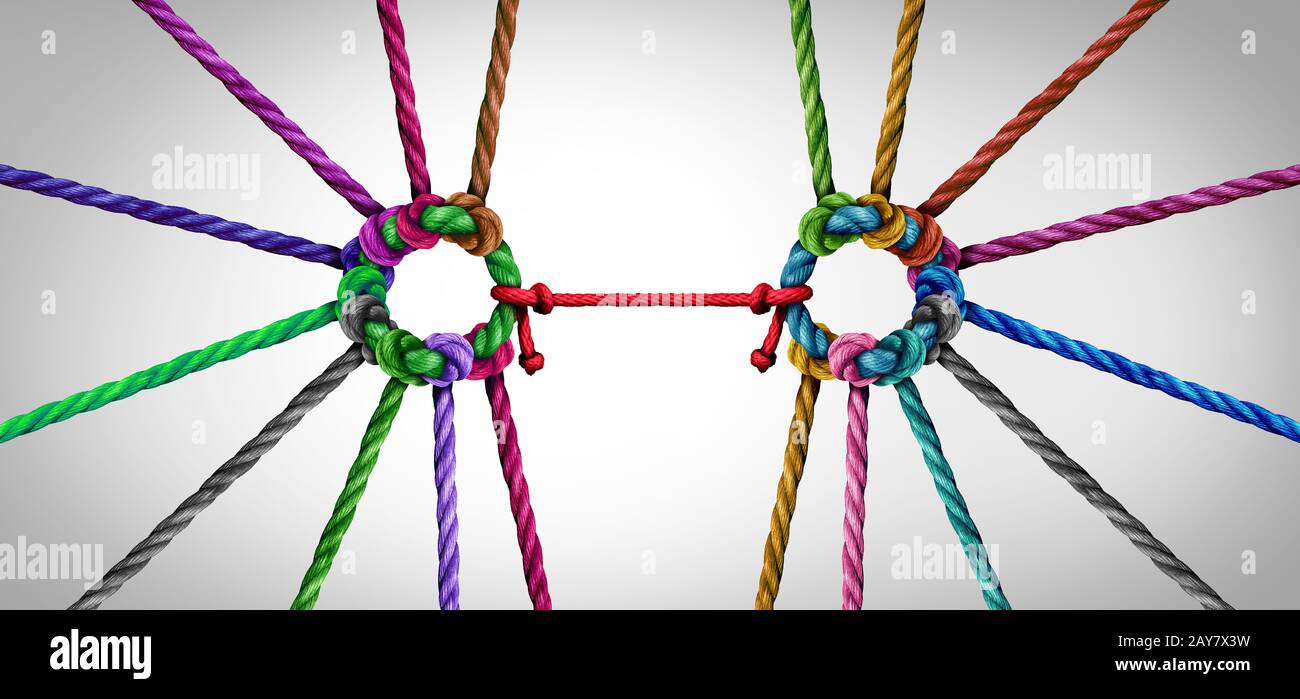 United teamwork concept as a business metaphor for joining a unity partnership as diverse ropes groups connected together as a corporate symbol. Stock Photo