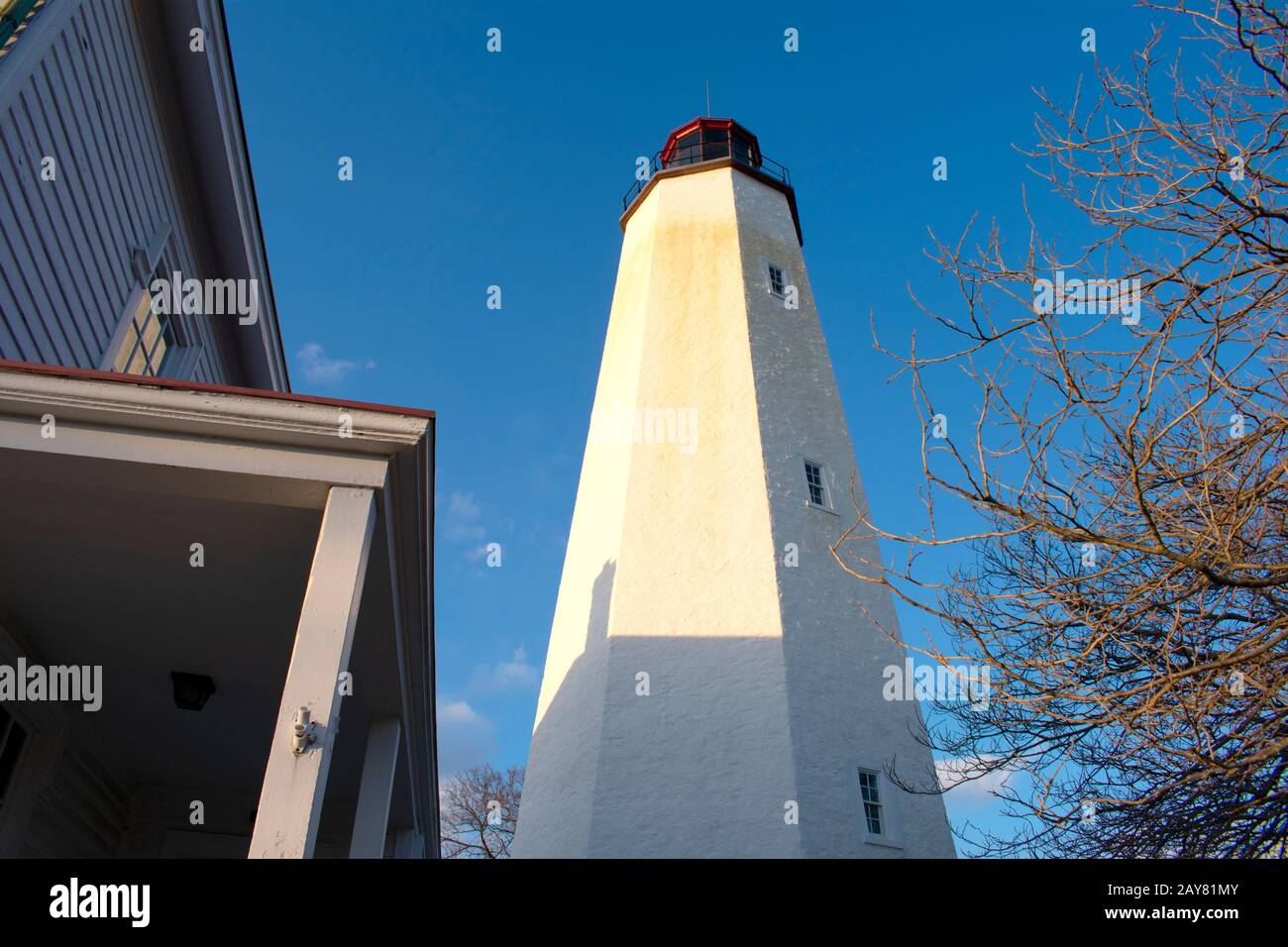 Lighthouse in Sandy Hook, New Jersey, during daylight hours, with the light turned off -22 Stock Photo