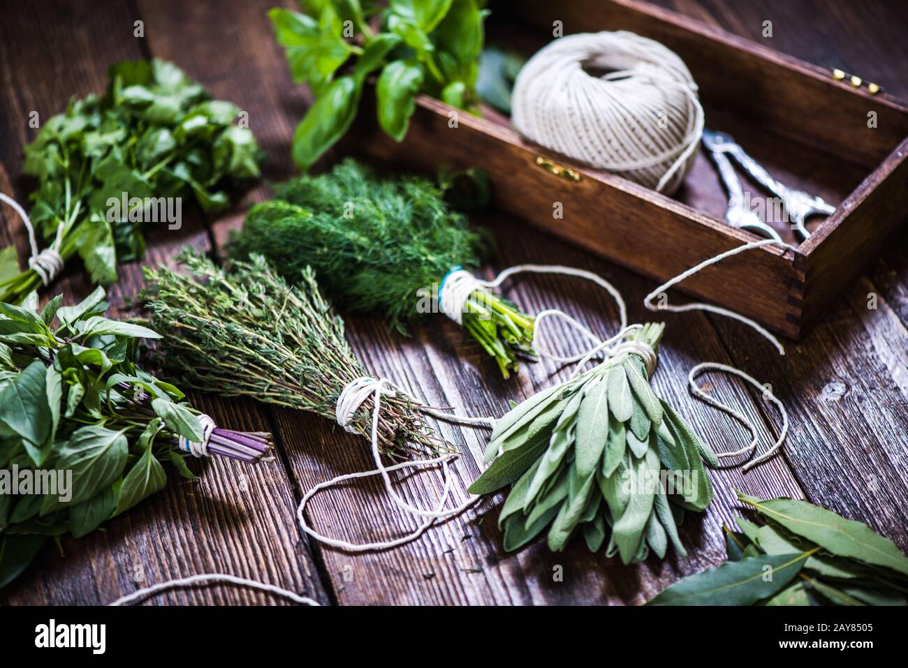 fresh herbs on wooden table Stock Photo