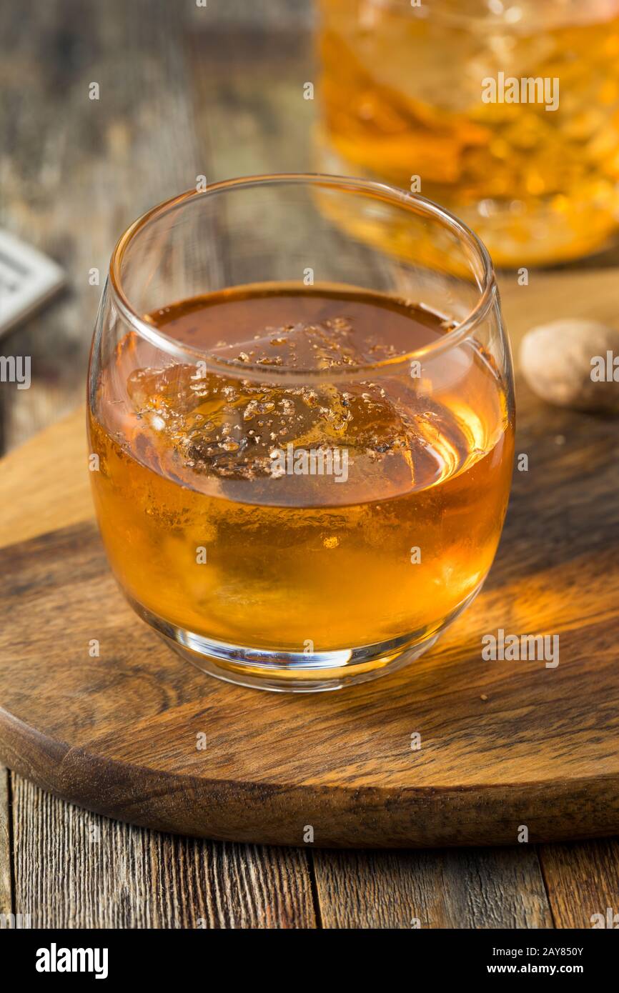 Homemade Refreshing Rum Bumbo Cocktail with Nutmeg Stock Photo