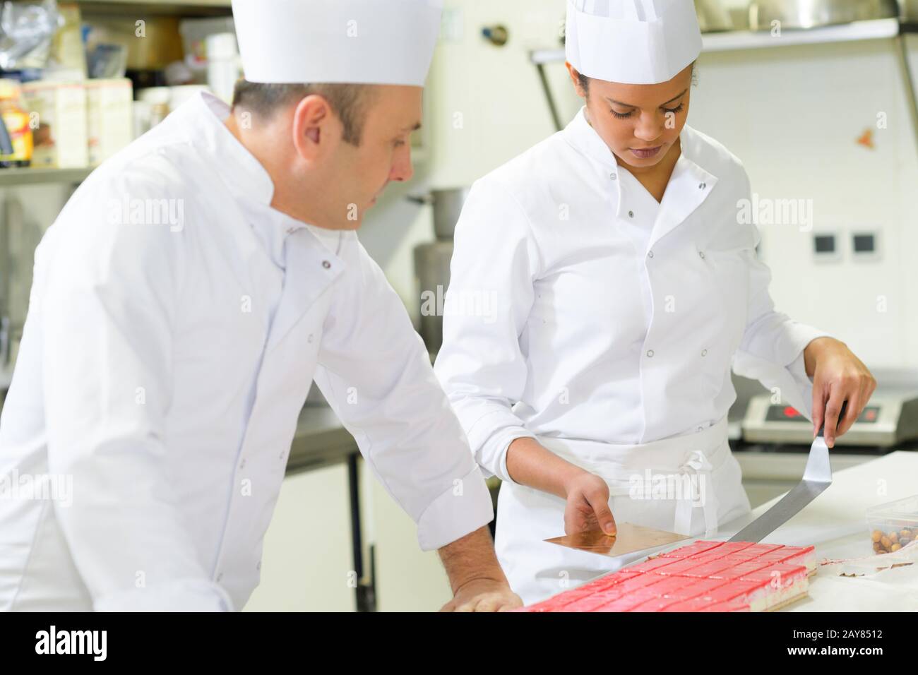 Young apprentice woman making hi-res stock photography and images - Alamy