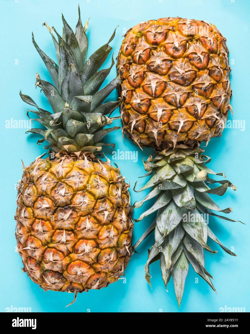 Fresh pineapple cut in half Stock Photo Alamy