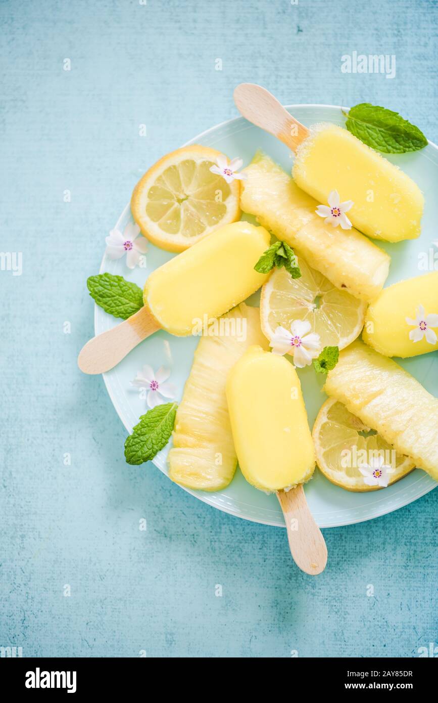 Lemon and pineapple popsicles Stock Photo