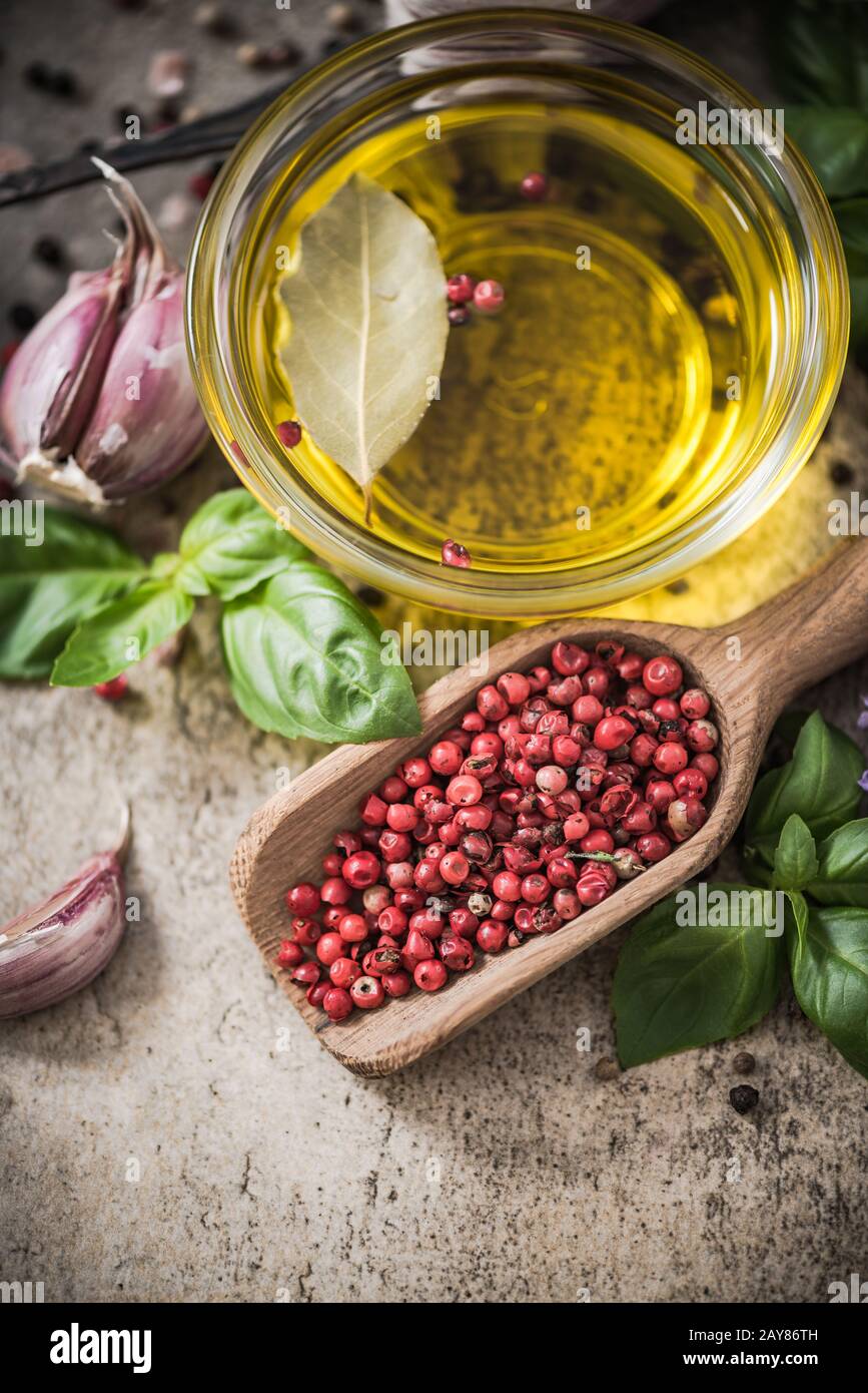 Fresh herbs, olive oil and spices Stock Photo
