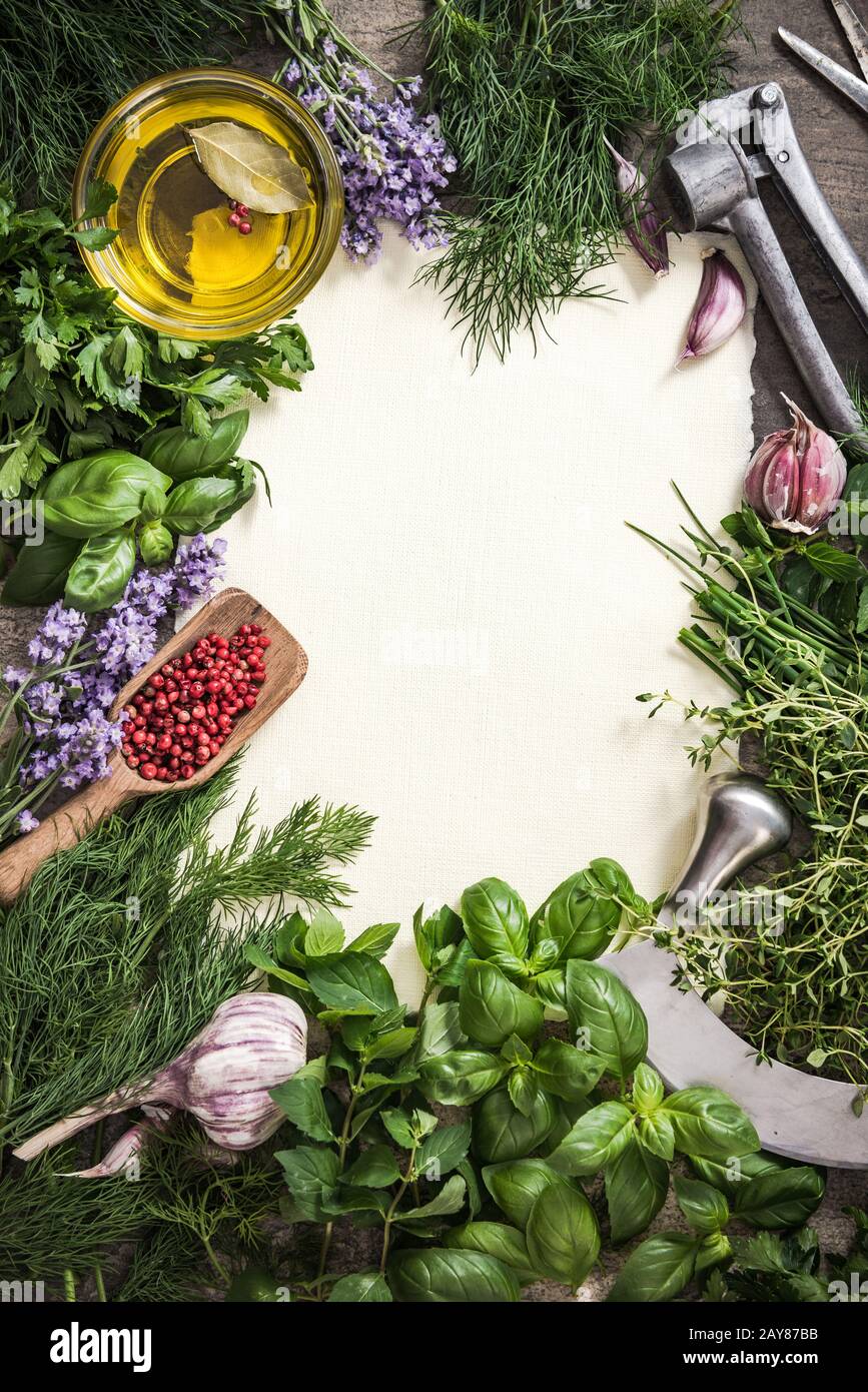 Fresh herbs and spices with recipe copy space, top view Stock Photo