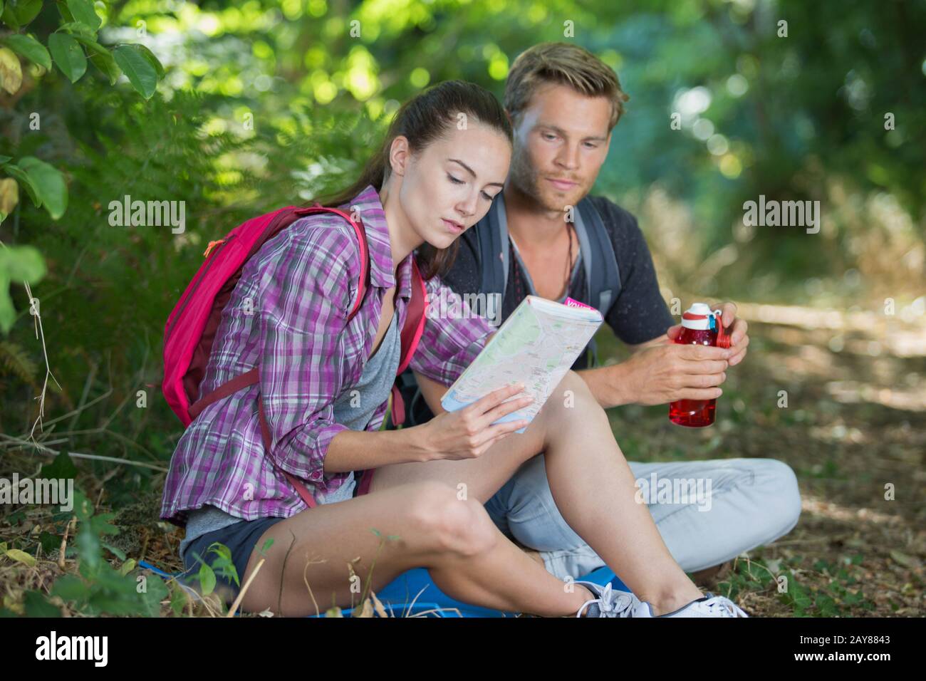 Female hiker standing map in hi-res stock photography and images - Alamy
