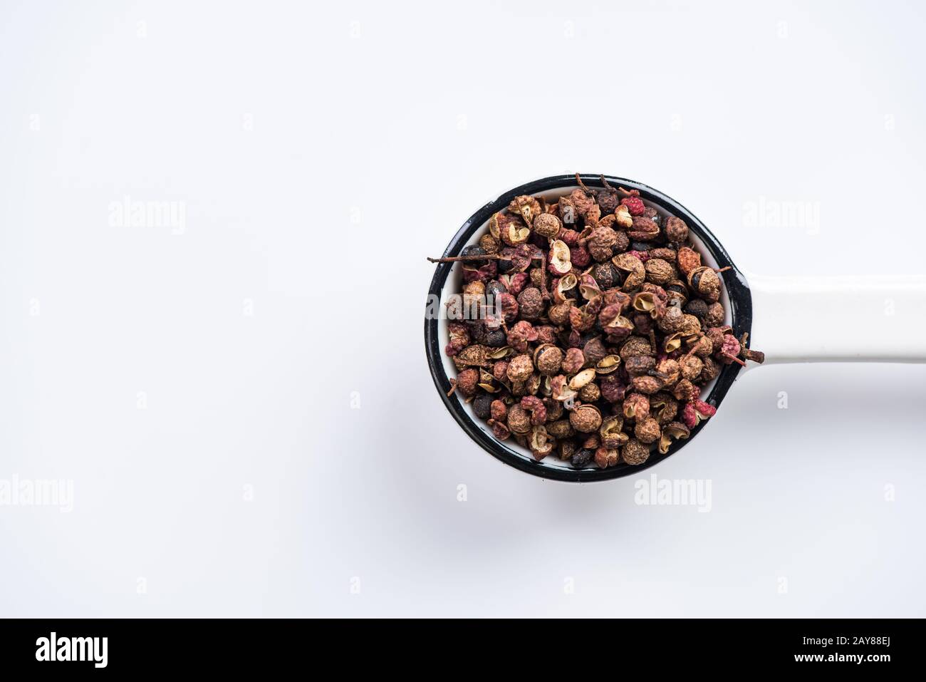 Sichuan pepper or Chinese coriander on spoon Stock Photo