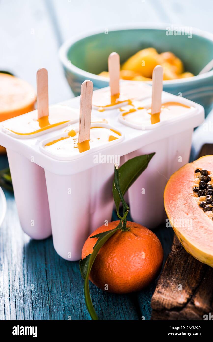 Refreshing treat, exotic fruits lolly, popsicle Stock Photo